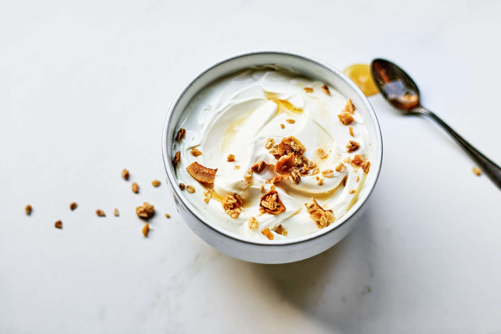 organic greek yogurt topped with honey and oats
