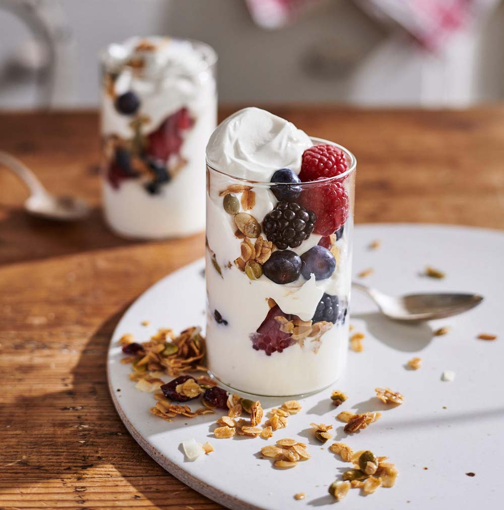 straus greek yogurt in a glass with berries and granola