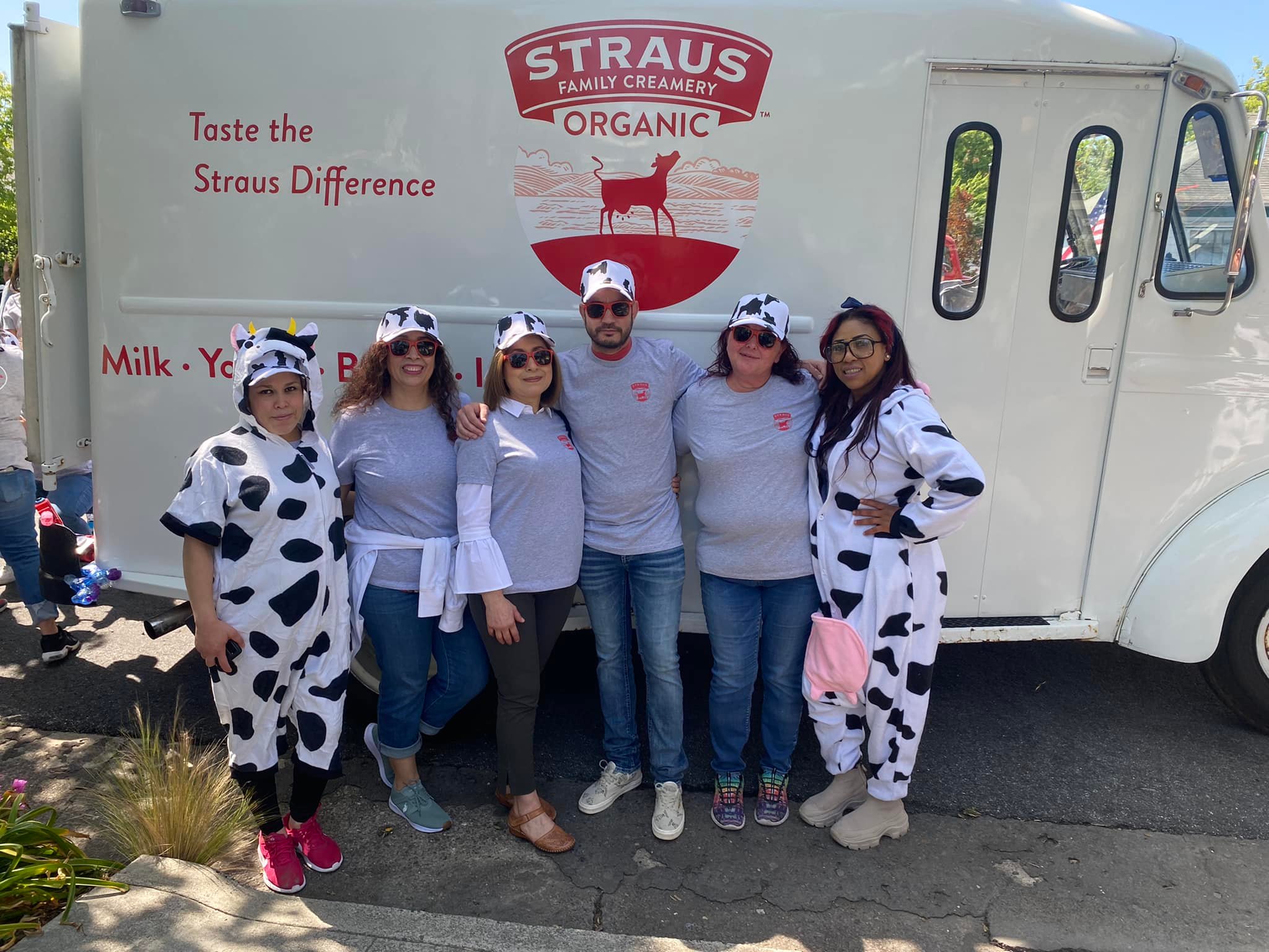 group photo in front of straus family creamery ice cream truck