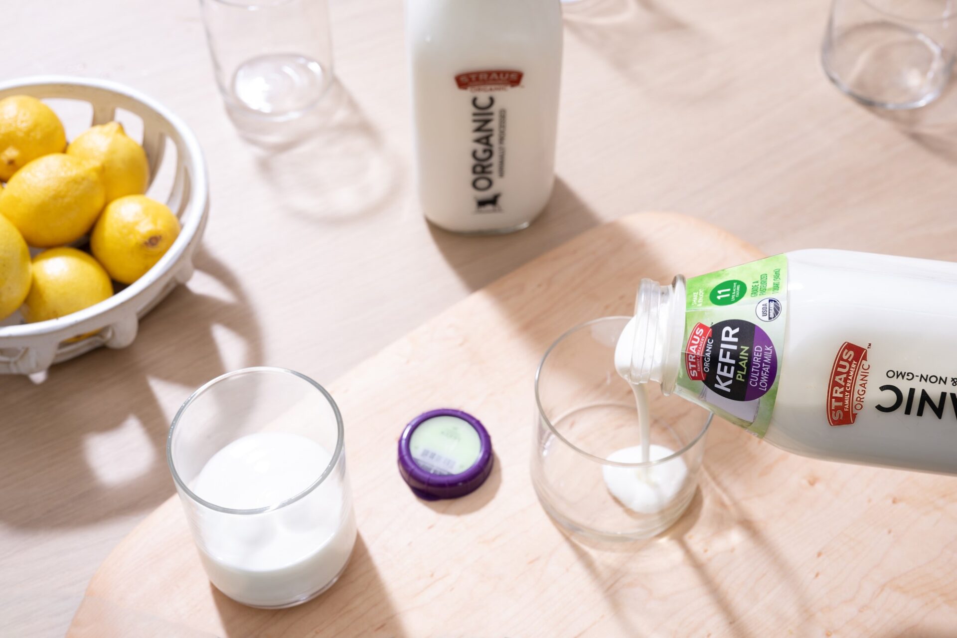 Organic kefir being poured into a glass